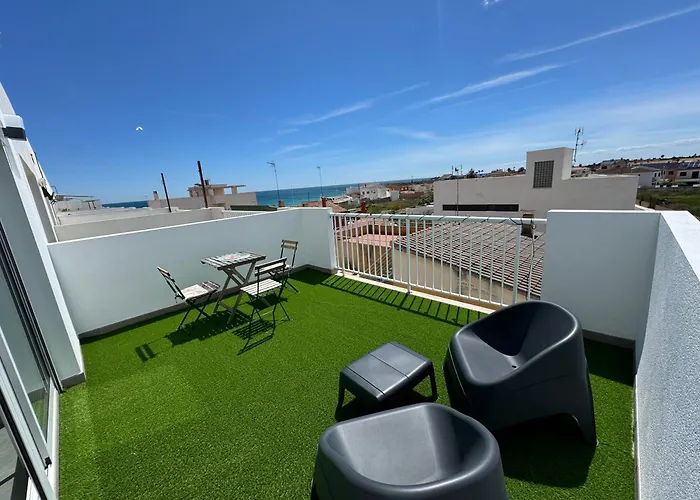 Adosado Privado Playa 度假居 *